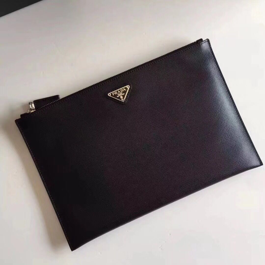 Prada clutch bag (Category: Bags & Wallets) located in Singapore. Submitted by vogue_luxury (Listing ID 166364550, Image 3). Description: From: 🇮🇹 Size: 28cm Material: 100% leather 🐃 Full certification with box Available for preorders: within 15~30 days, subject to customs clearance delay. Retail above $1.5k Now on best offer! Sample pics are for reference only Thank you.