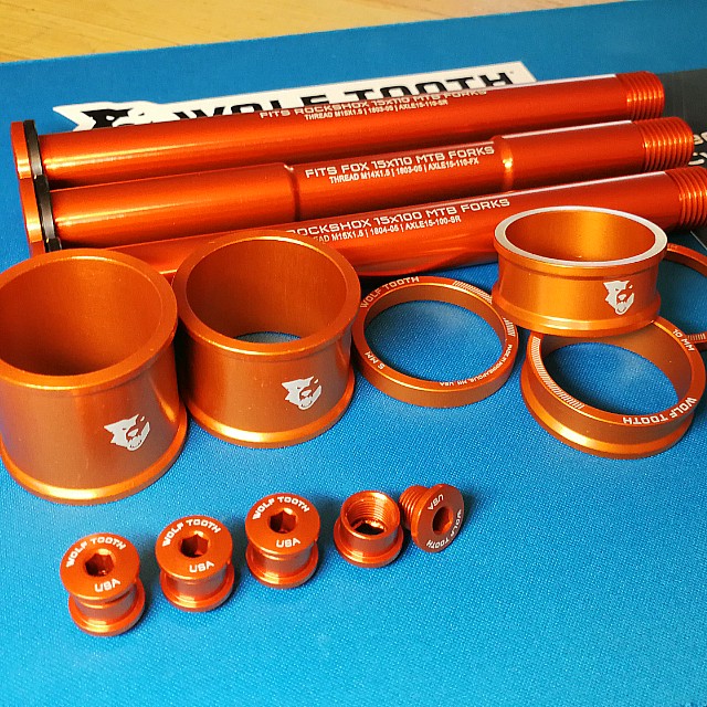 Wolf Tooth Components Orange blings to match Rockshox Fork