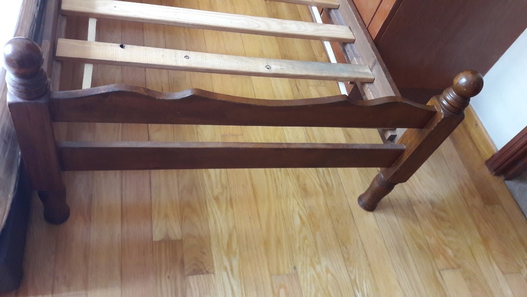 Single Bedframe (Category: Bed Frames & Mattresses) located in Singapore. Submitted by 3larch (Listing ID 166540554, Image 3). Description: Dark brown stained solid timber bed frame. Beautifully carved headboard and legs. Sturdy and lasting. Item is Already dismantled. Can be transported easily. Easy to assemble with precision screws. Solid timber slats. Fit regular sized single mattress. (Mattress in 1st pic not included).