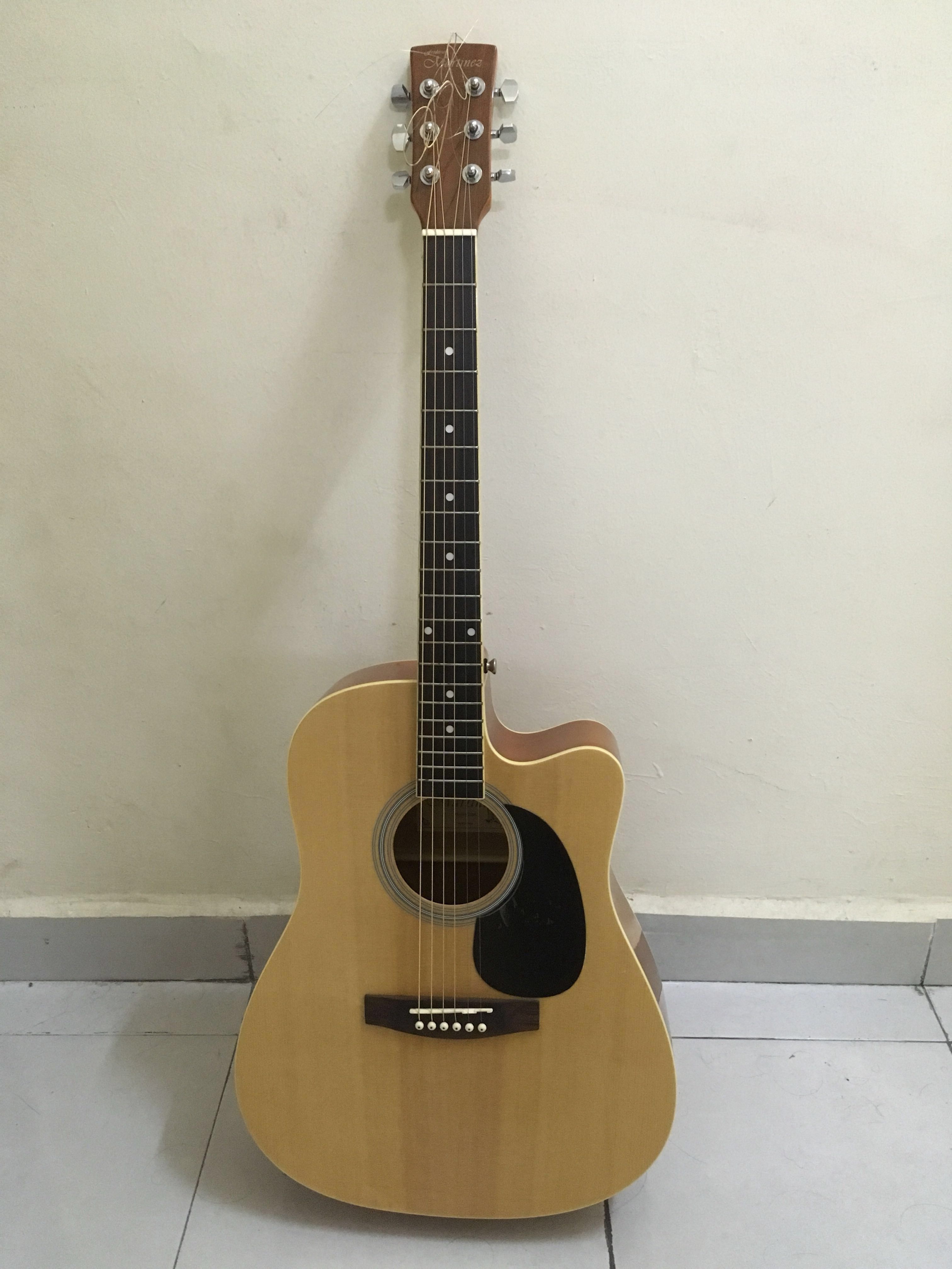 Frederick deals martinez guitar
