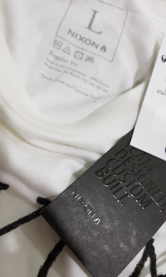 Nixon writing tee made in USA (Category: Tshirts & Polo Shirts) located in Singapore. Submitted by wearware (Listing ID 166967592, Image 3). Description: Made in USA Only $45 Brand new with tags 100% authentic Almost half of retail price.
