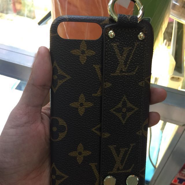 SALE-lv iphone case with hand and ring holder (Category: Cases & Sleeves) located in Quezon City. Submitted by auspv_collections (Listing ID 150291643, Image 1). Description: high quality leather iphone LV case iphone model: 6, 7, 8 and plus edition for shipping only pre order case payment now ship tomorrow 😉.