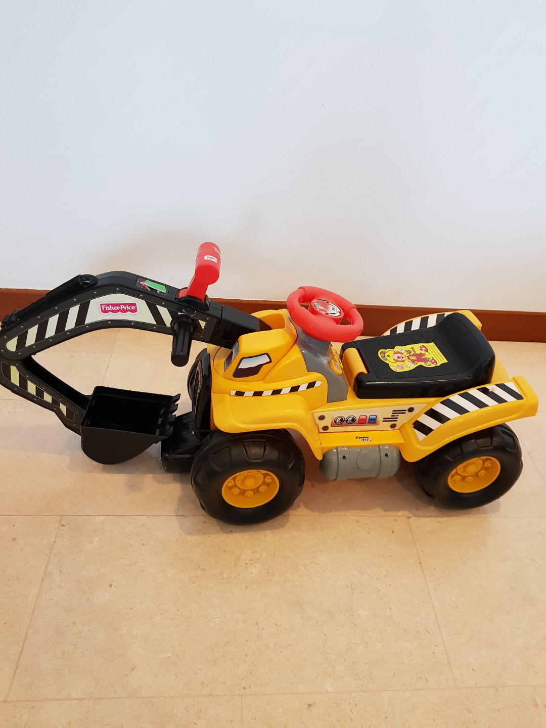 fisher price dig and ride