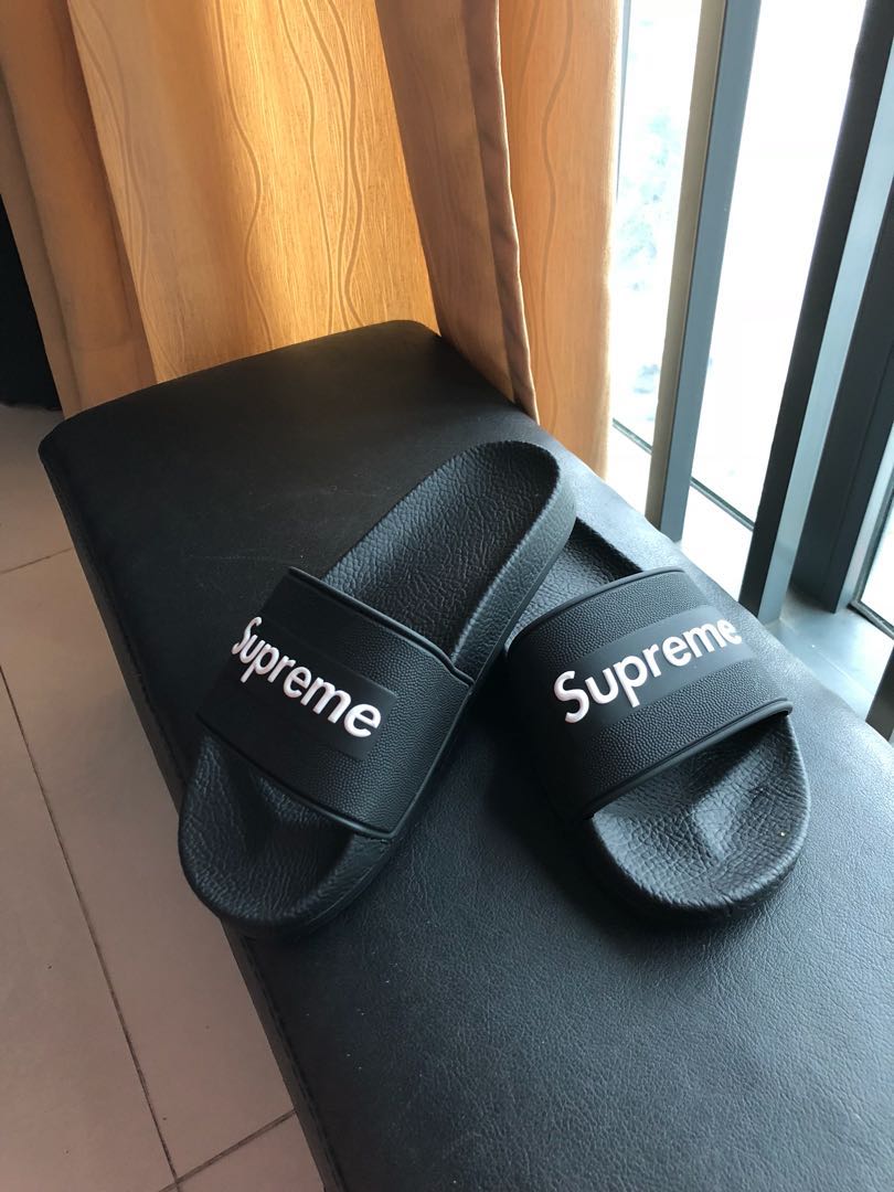 supreme flip flops black