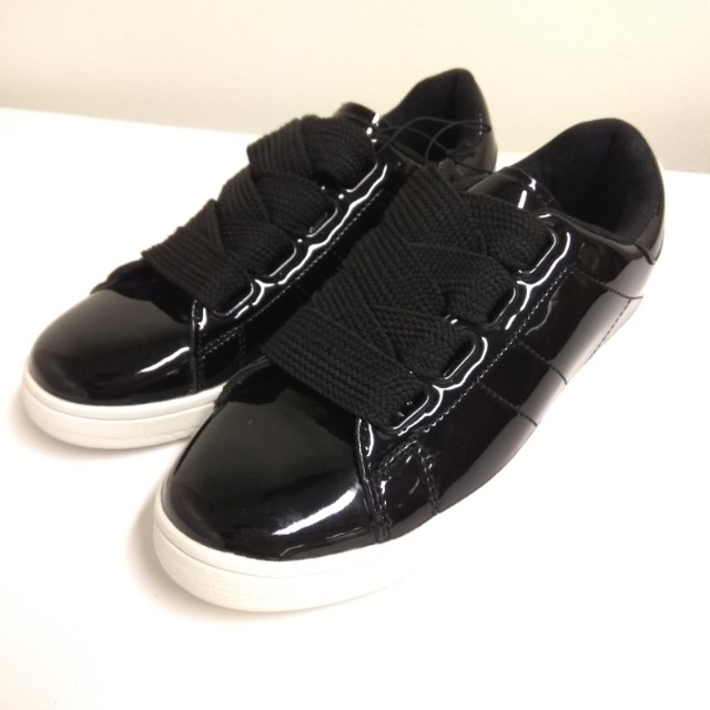 shiny black sneakers