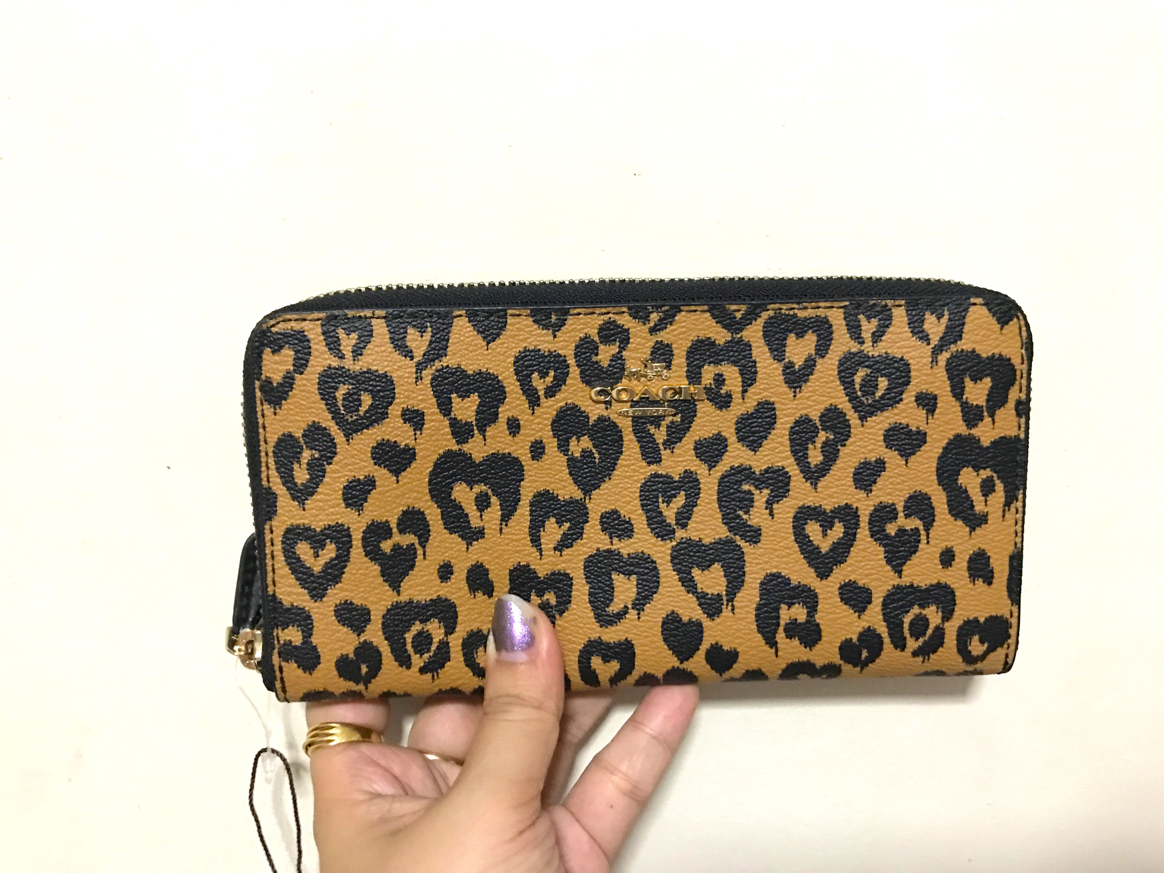 Cheetah coach wallet store