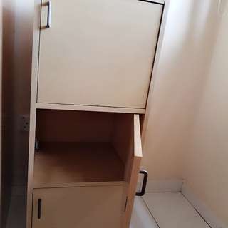 3 doors pine dust wood cabinets.