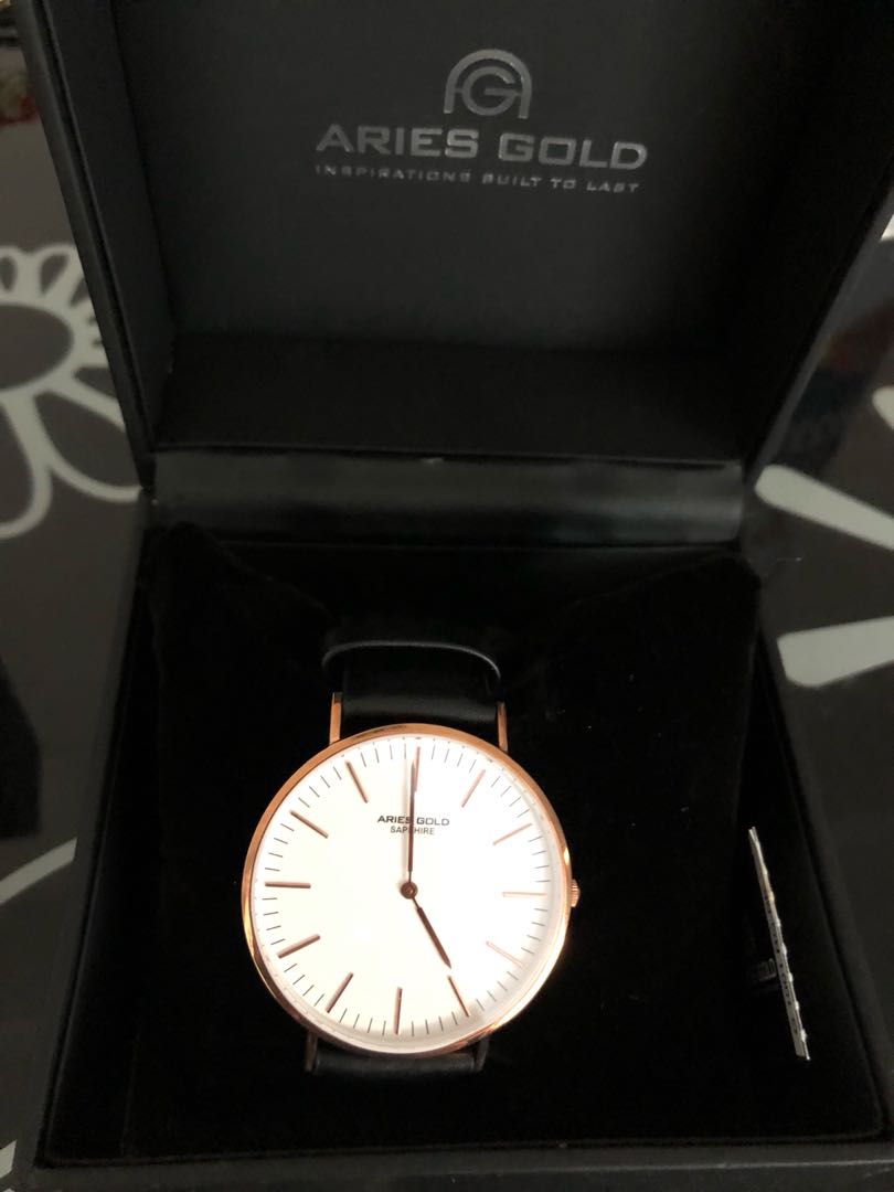 Aries gold new arrivals sapphire watch