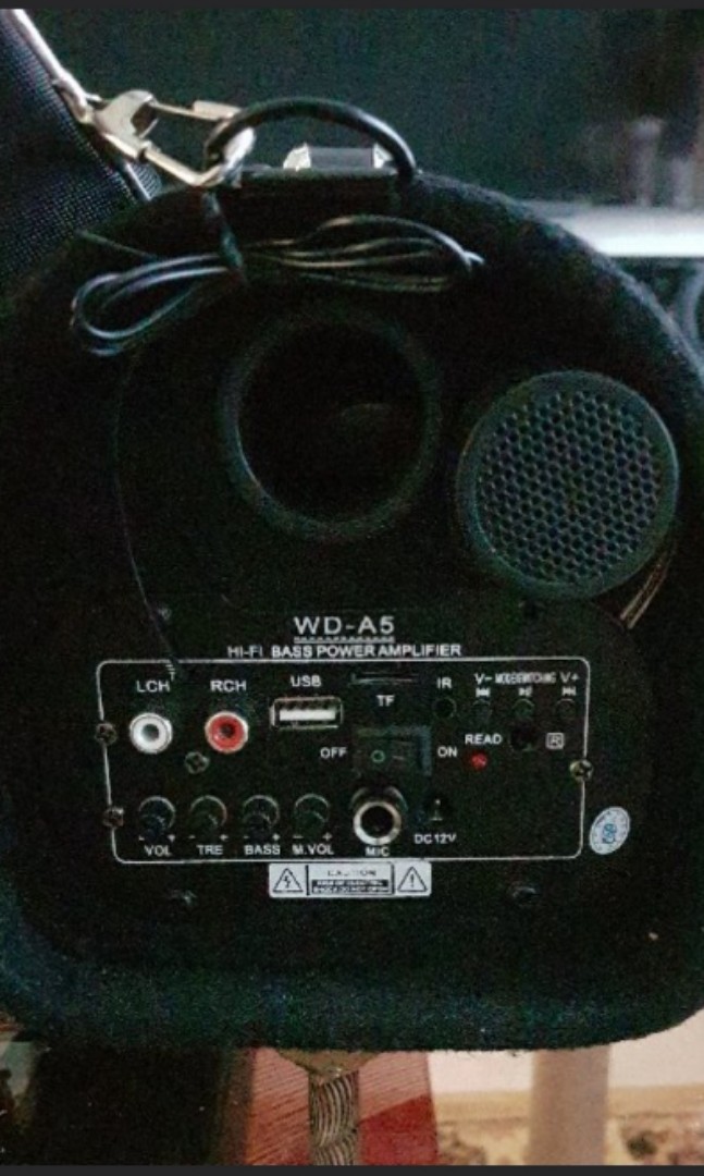 Bluetooth speaker (Microcase) (Category: Soundbars, Speakers & Amplifiers) located in Singapore. Submitted by perfectionzxc (Listing ID 168292001, Image 2). Description: Traveling karaoke system. Features: Bluetooth speaker Karaoke system FM radio Able to use it in cars too!!.