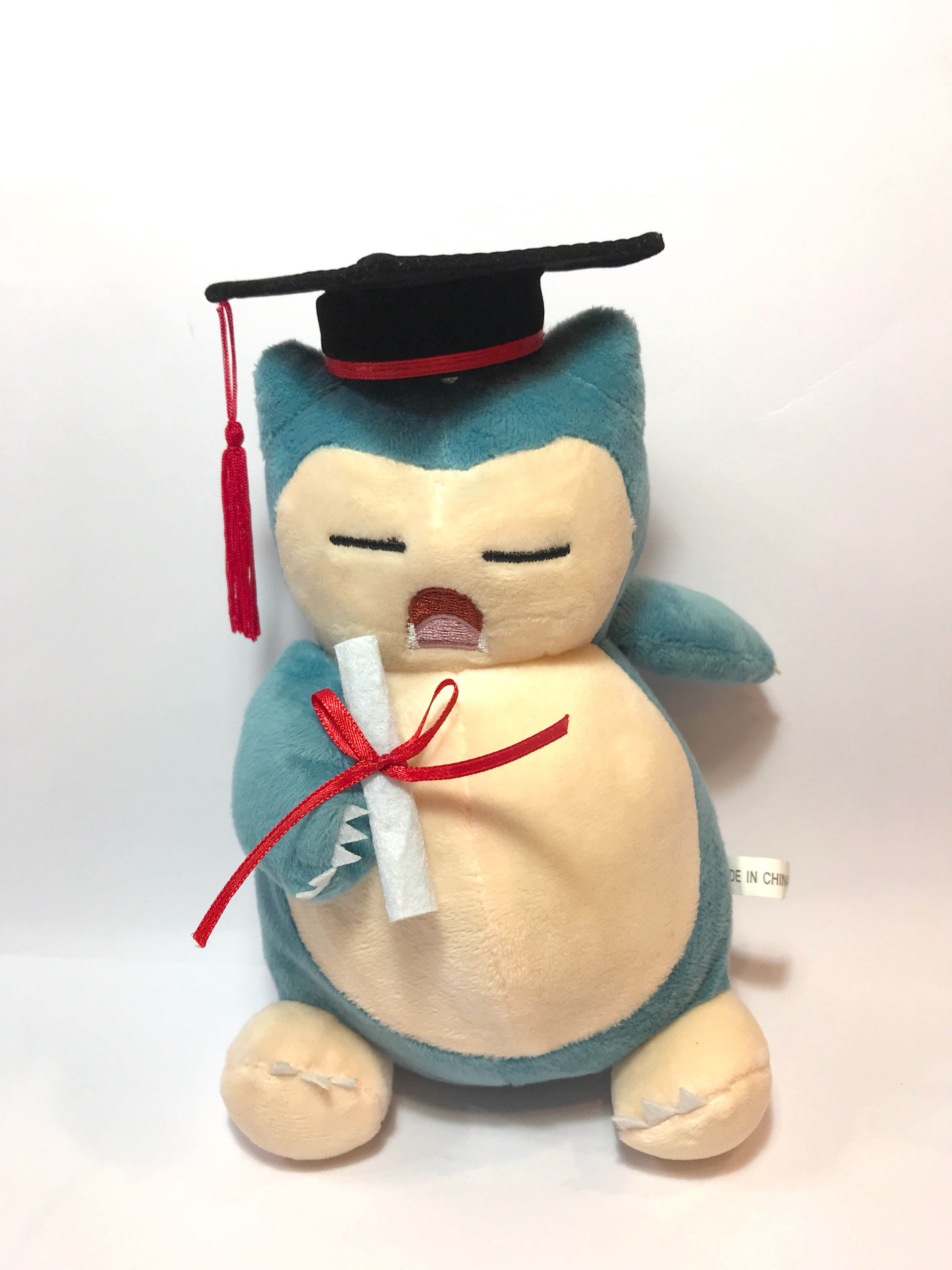 Snorlax hotsell graduation plush