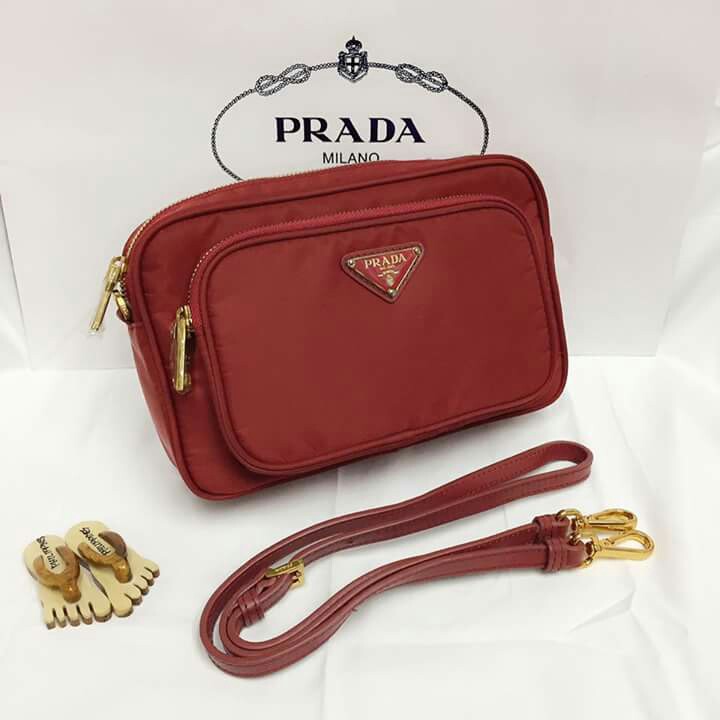 Prada Red Nylon slingbag (Category: Luxury Bags & Wallets) located in Manila. Submitted by mylittlewardrobe88 (Listing ID 168166133, Image 1). Description: Authentic high end Prada 24x15cm With papaerbag and receipt.