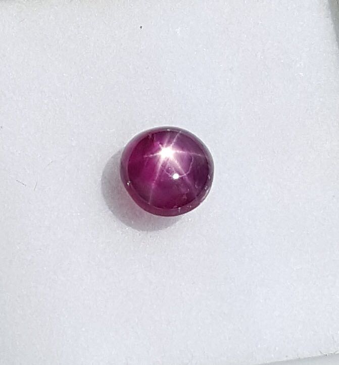 Star Ruby (Category: Precious Stones) located in Singapore. Submitted by firstgem (Listing ID 168236508, Image 2). Description: Color : Intense Puplish Red Weight : 2.64 cts Shape : Cabochon Size : Approx 7.2 x 4.7 mm Clarity Grading Scales VVS1,VVS2 - Very Very Small Inclusions Extremely difficult to see inclusion under 10x magnification. VVS1 is slightly cleaner than VVS2 VS1,VS2 - Very Small Inclusions Minor inclusion only visible under 10x ma
