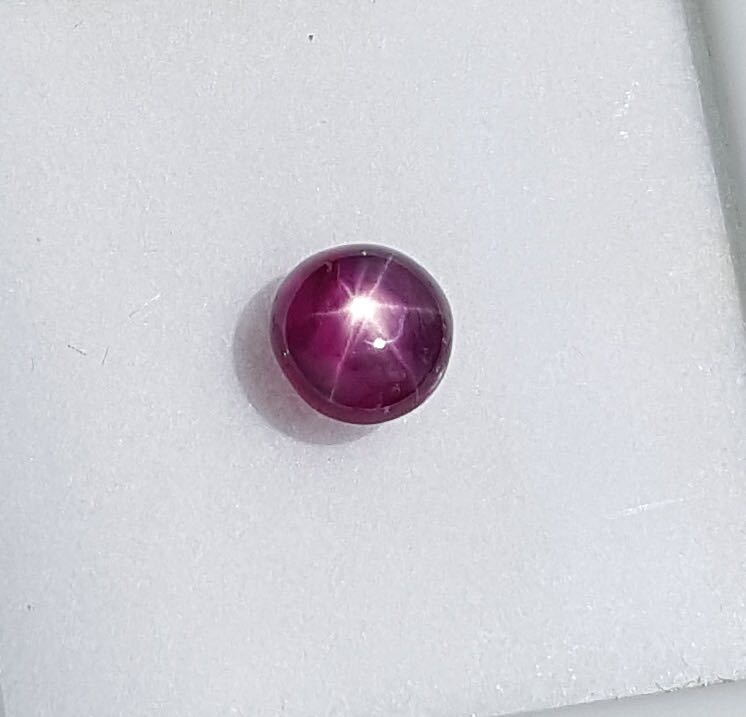 Star Ruby (Category: Precious Stones) located in Singapore. Submitted by firstgem (Listing ID 168236508, Image 3). Description: Color : Intense Puplish Red Weight : 2.64 cts Shape : Cabochon Size : Approx 7.2 x 4.7 mm Clarity Grading Scales VVS1,VVS2 - Very Very Small Inclusions Extremely difficult to see inclusion under 10x magnification. VVS1 is slightly cleaner than VVS2 VS1,VS2 - Very Small Inclusions Minor inclusion only visible under 10x ma