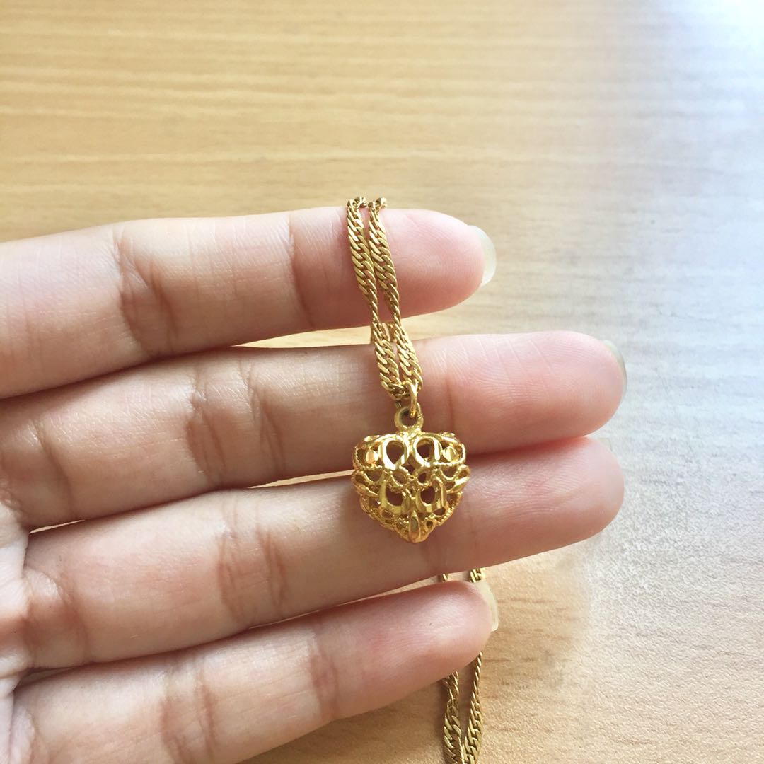 Caged discount heart necklace