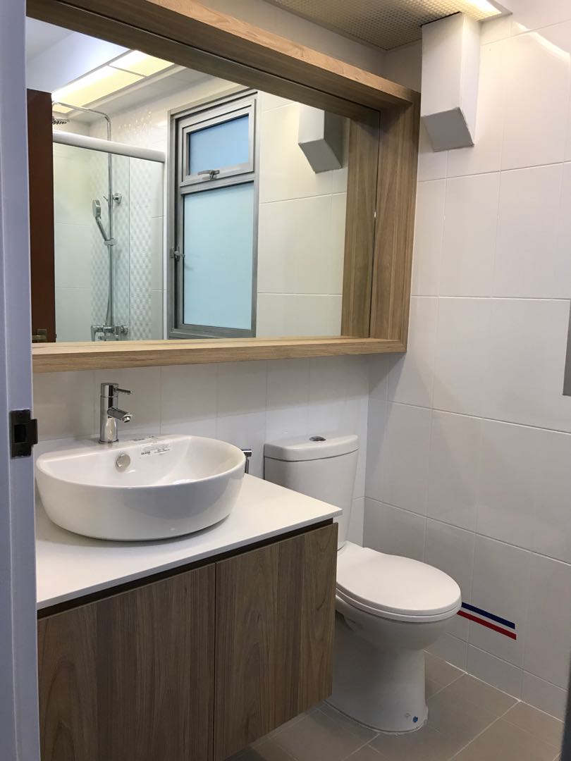 Black Bathroom Cabinets With White And Grey Counter Top And Black