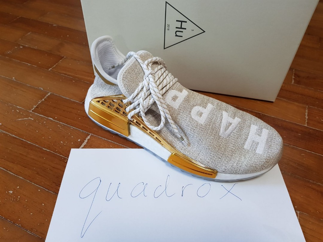 Human race gold china top