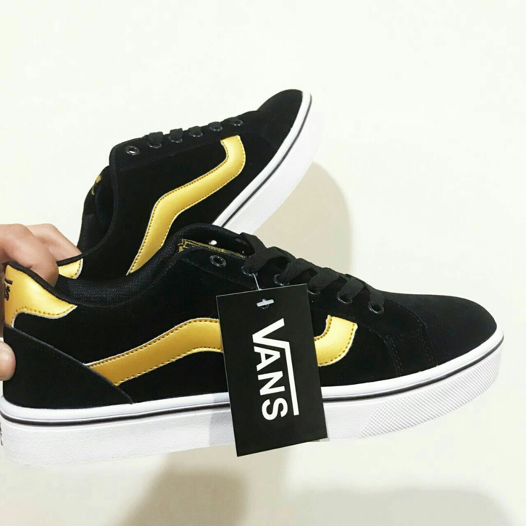 black and gold vans high tops