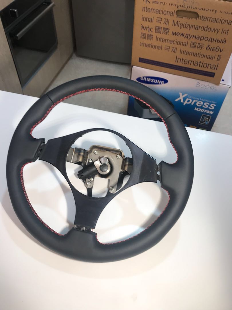 Evo 9 Nappa Leather steering wheel wrapping service, Car Accessories, Accessories on Carousell