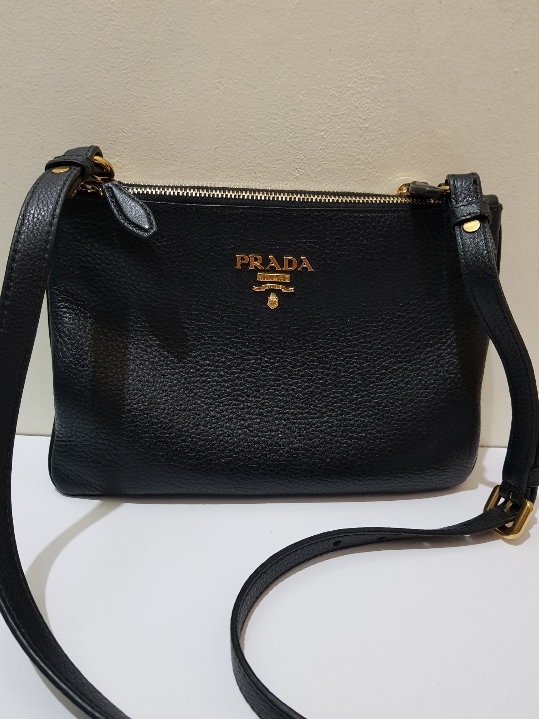 Prada double outlet zip sling bag