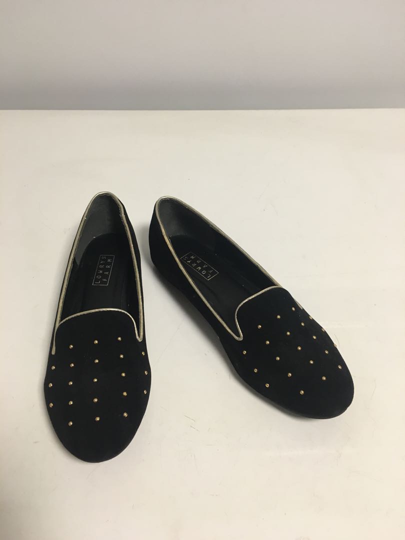 black loafers gold