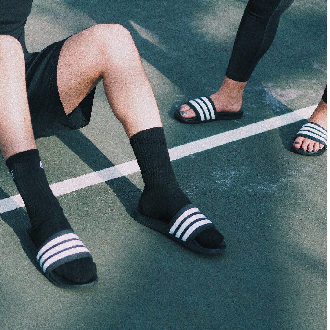 adidas adilette slides on feet
