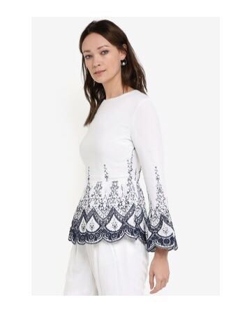 white broderie peplum top