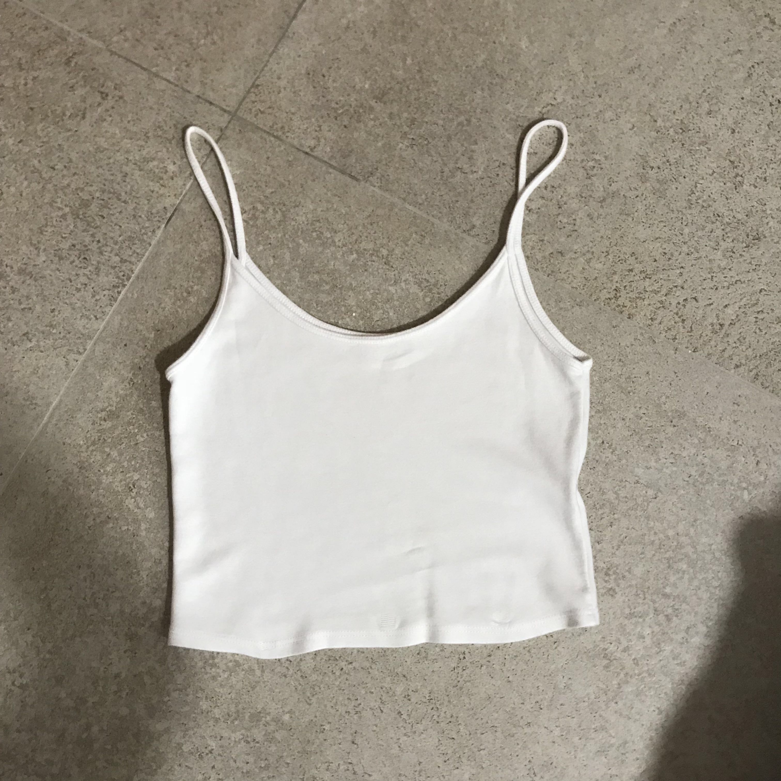 Brandy Melville White Tank Top Women S Fashion Tops Other Tops On Carousell