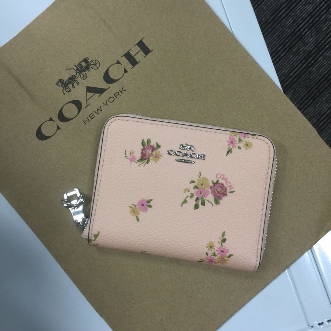 Pink coach wallet with flowers sales