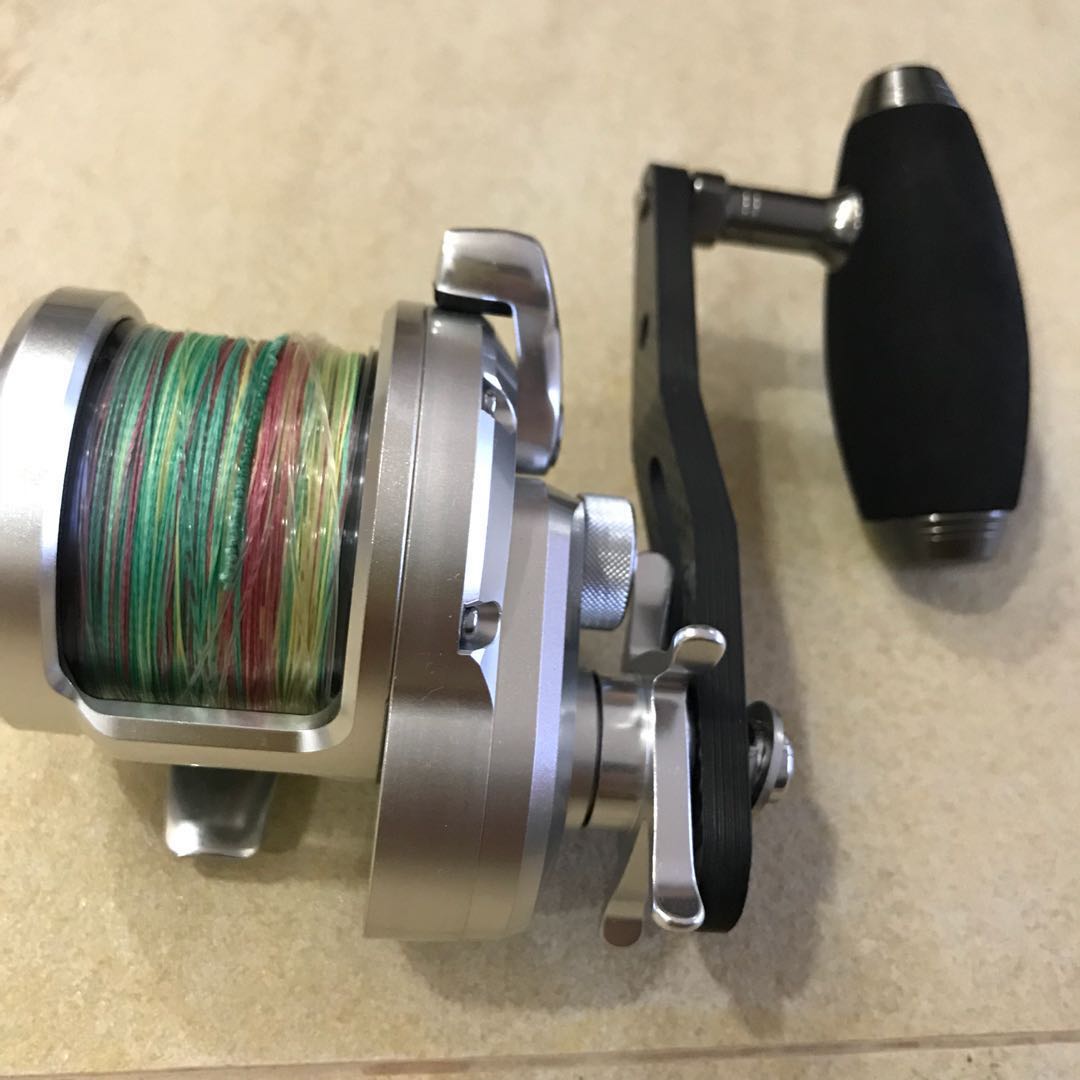 Jigging reel handle carbon fibre. with bullet / t-bar knob, Sports  Equipment, Fishing on Carousell