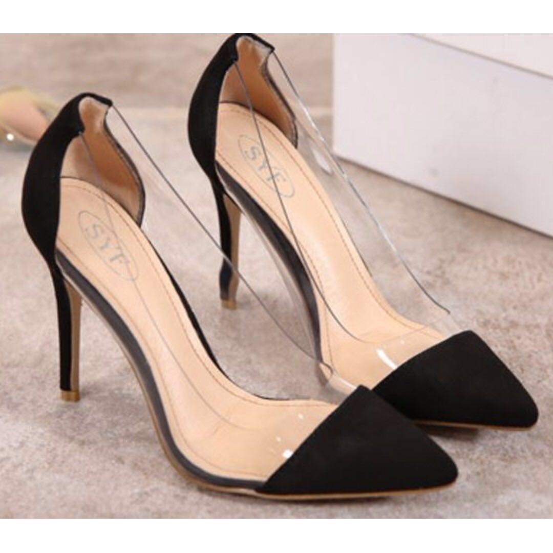 black shoes with glass heels
