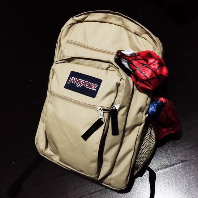 field tan jansport backpack
