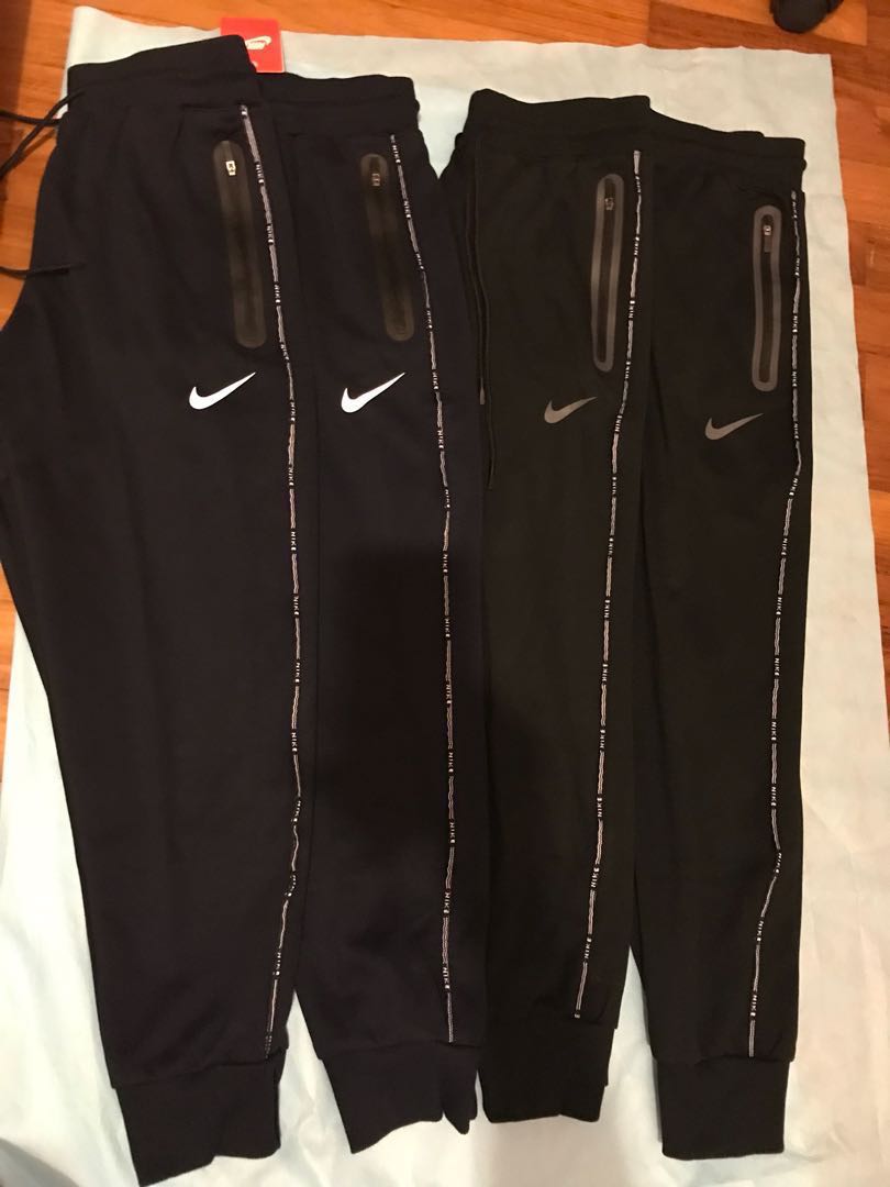 Nike Track Pants with vertical zipped 