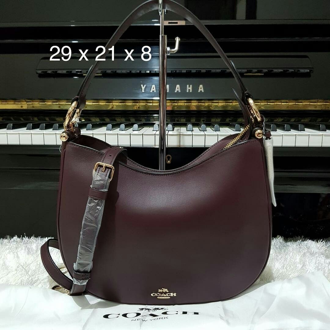 Coach nomad crossbody bag oxblood deals