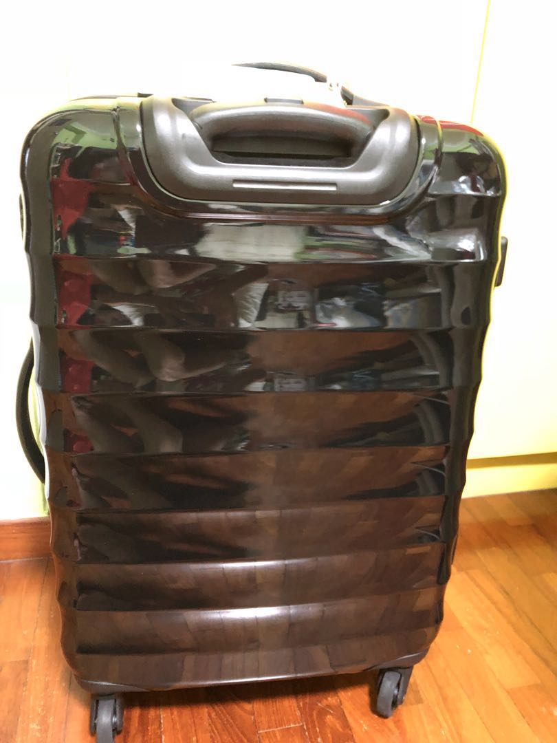 american tourister paralite spinner