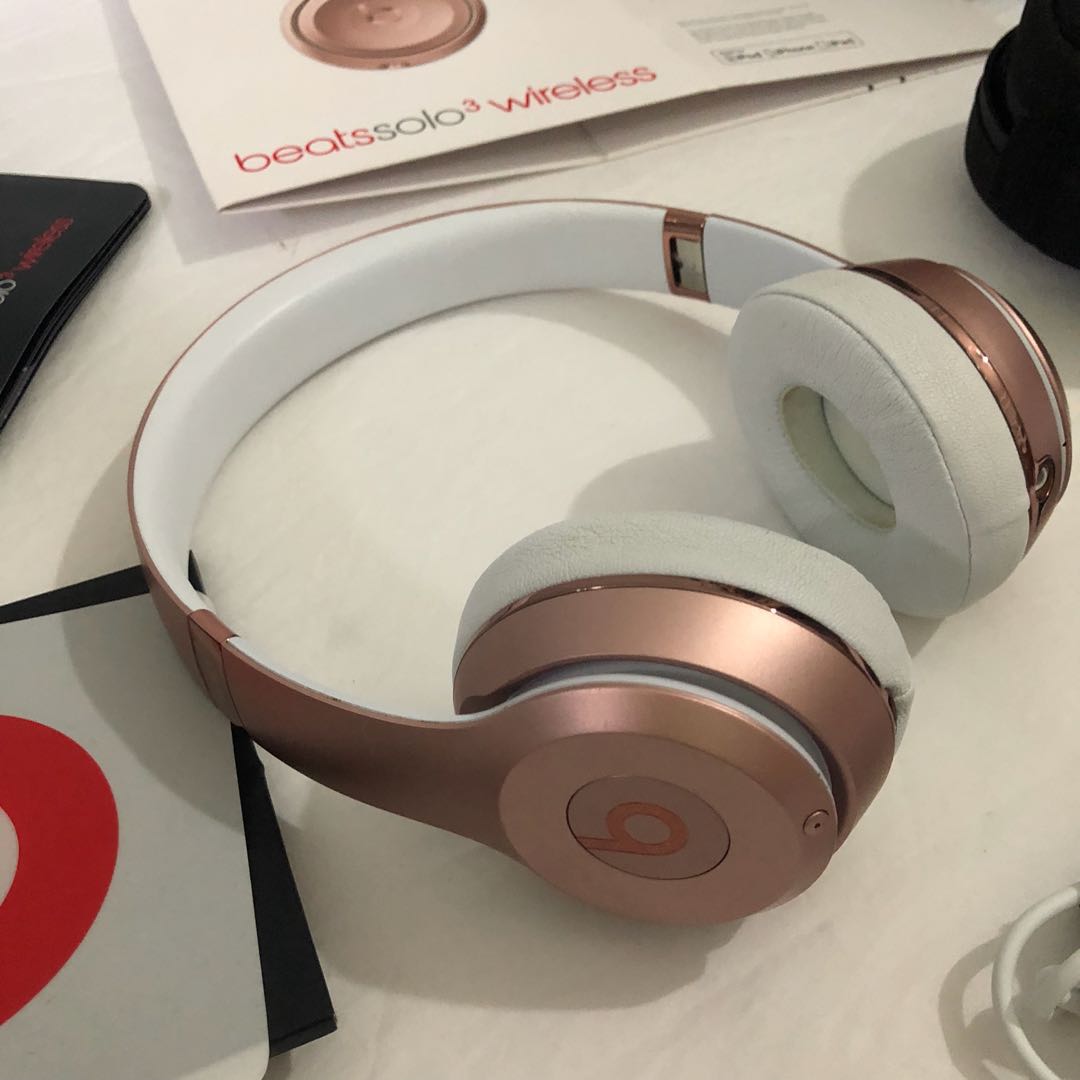 rose gold beats wireless earphones