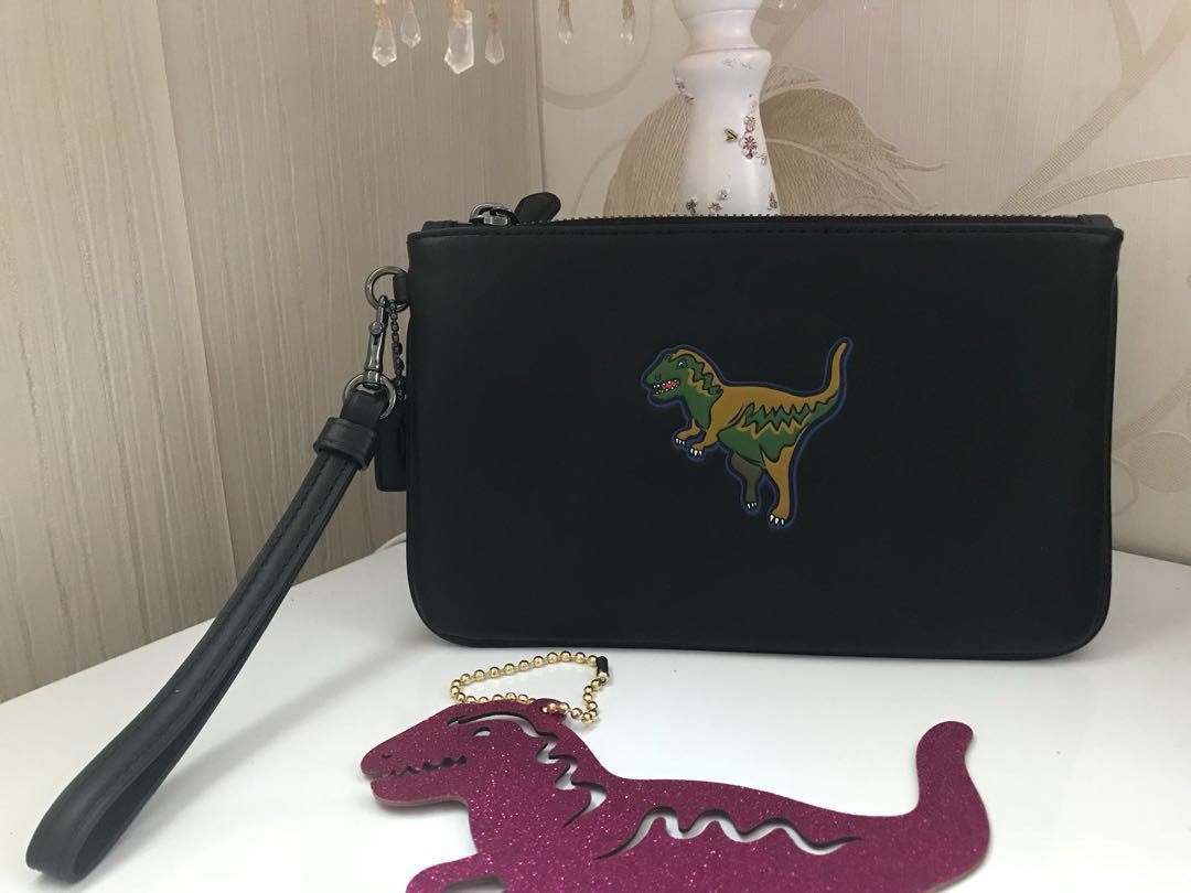 Coach Dinosaur wrislets wallets, Women's Fashion, Bags & Wallets