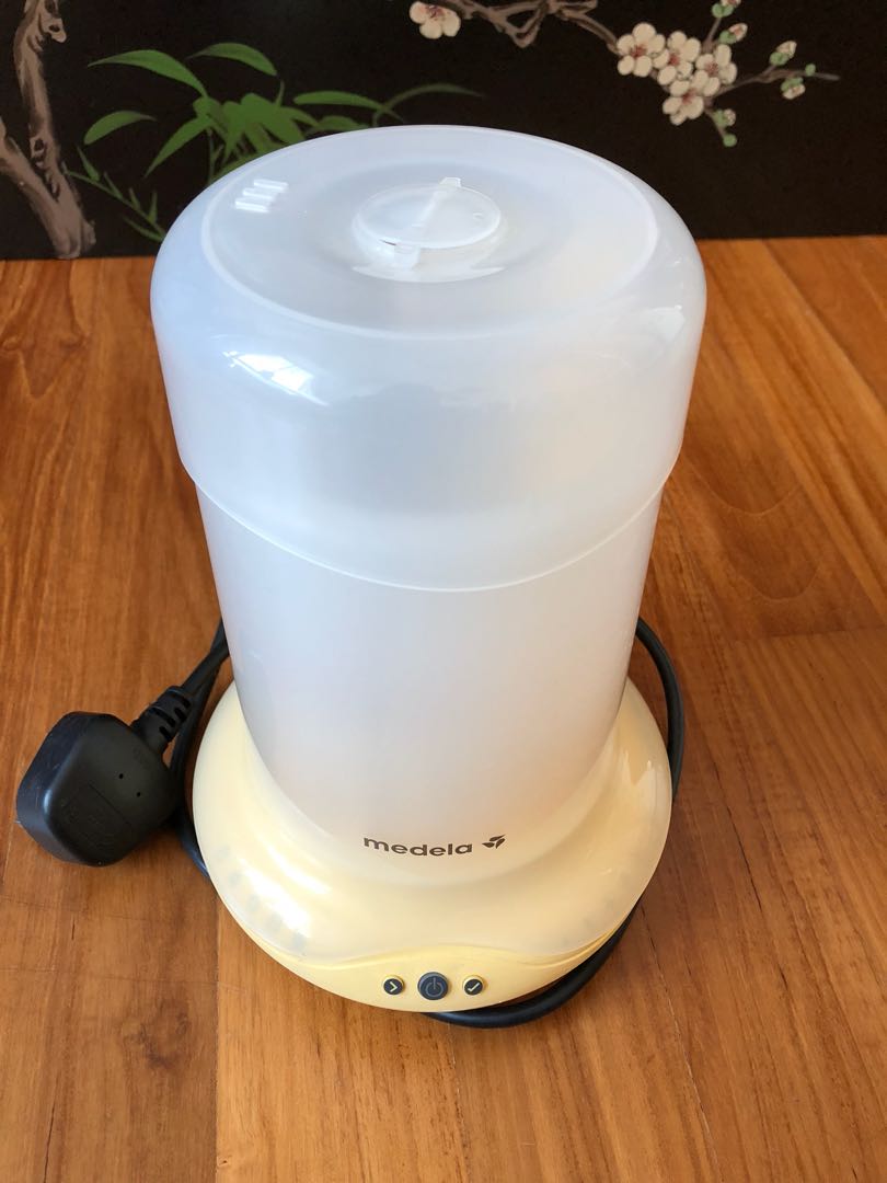 Medela bottle warmer, Babies & Kids, Nursing & Feeding, Breastfeeding
