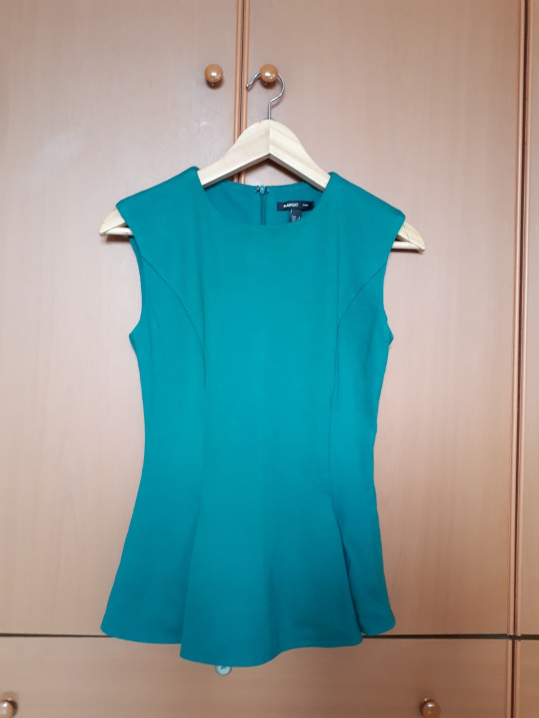 green peplum shirt