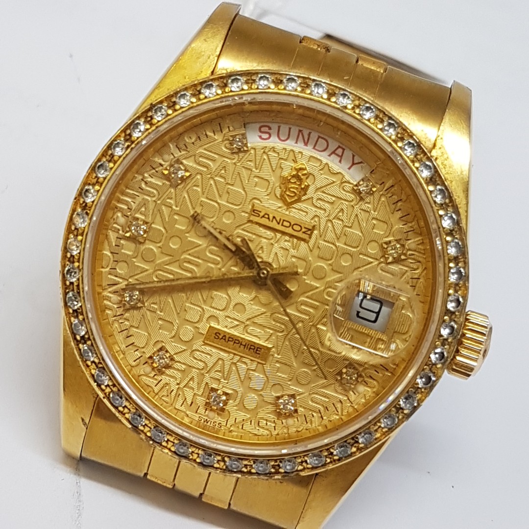Sandoz gold watch price best sale