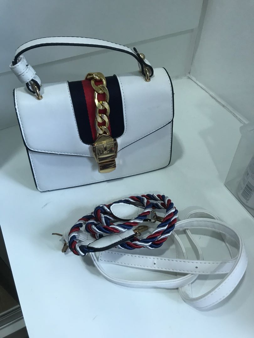 Gucci sling online bag white