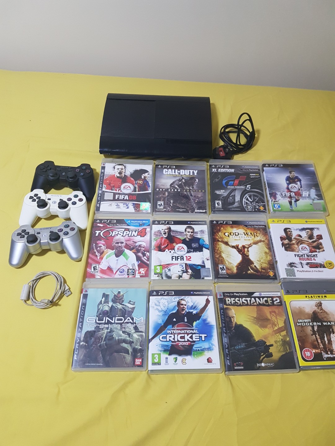 PS3 (Category: PlayStation) located in Singapore. Submitted by ramkrishna (Listing ID 171777546, Image 2). Description: Selling PS3 Slim 500 GB ALL ITEMS IN PHOTO INCLUDED DOES NOT COME WITH BOX AND HDMI CABLES I HAVE ONLY 1 WIRE FOR THE DUALSHOCK CONTROLLERS 220.