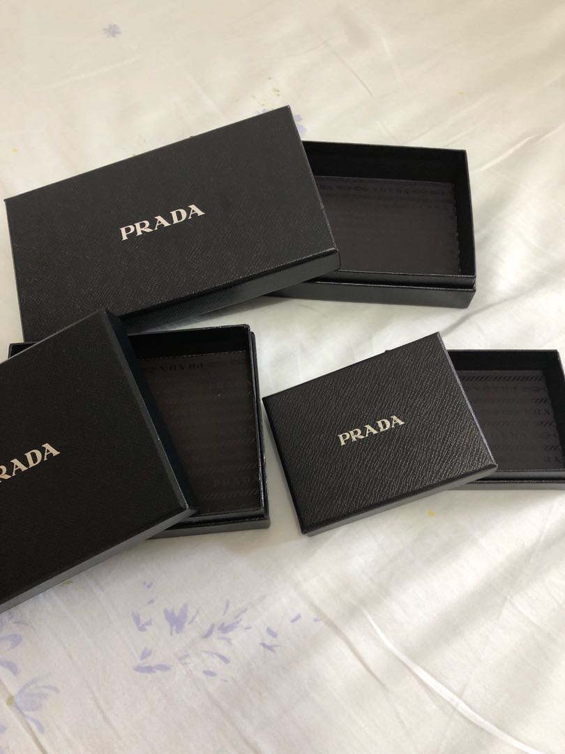 Prada Boxes (Category: Accessories) located in Singapore. Submitted by happycarousel (Listing ID 171675295, Image 2). Description: Very hard material All at $50 Dimensions Big - 22x12x5cm — $30 Medium - 16x13x4.5cm — $20 Small - 11.5x9x3.5cm — $10 Postage add 60c .