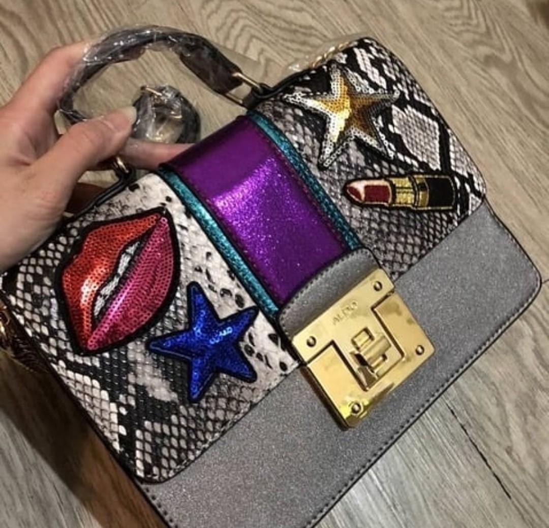 Aldo lipstick purse deals