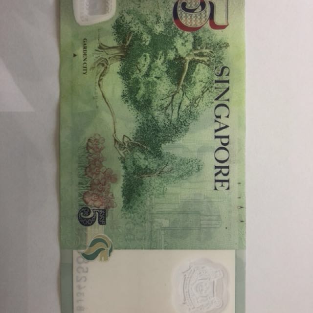 $5 printing error (Category: Currency) located in Singapore. Submitted by moopy (Listing ID 154496613, Image 3). Description: Selling a piece of $5 printing error notes. Item is AUNC with no fold or holes. Self collect at my place punggol and offer me ur price . Thanks.