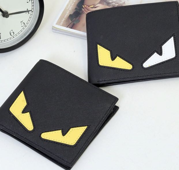 fendi yellow eyes wallet