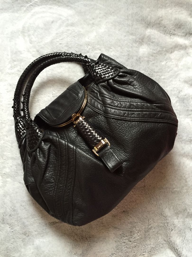 FENDI Nappa Spy Handbag (Category: Luxury Bags & Wallets) located in Bulacan. Submitted by relovedbydei (Listing ID 172896487, Image 1). Description: ✨FENDI Nappa Spy Handbag✨ This gorgeous Fendi Black Leather Spy Bag is popular among celebrities like Paris and Nikki Hilton, Kim Kardashian, Gwen Stefani and many more! It features luxurious rich black smooth leather and woven leather handles. There is a "secret" compartment on the flap closure and