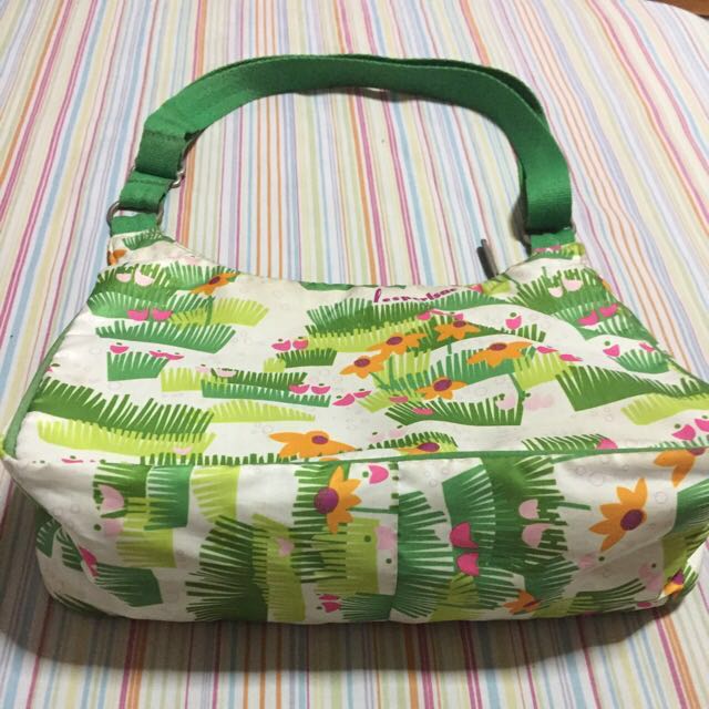 LESPORTSAC sling / Body bag only (Category: Cross-body Bags) located in Muntinlupa City. Submitted by mystyle10 (Listing ID 151629284, Image 3). Description: Preloved bag, just needs cleaning This can be a shoulder bag or a body bag Authentic, includes 1 pouch No haggling pls. Last price posted.