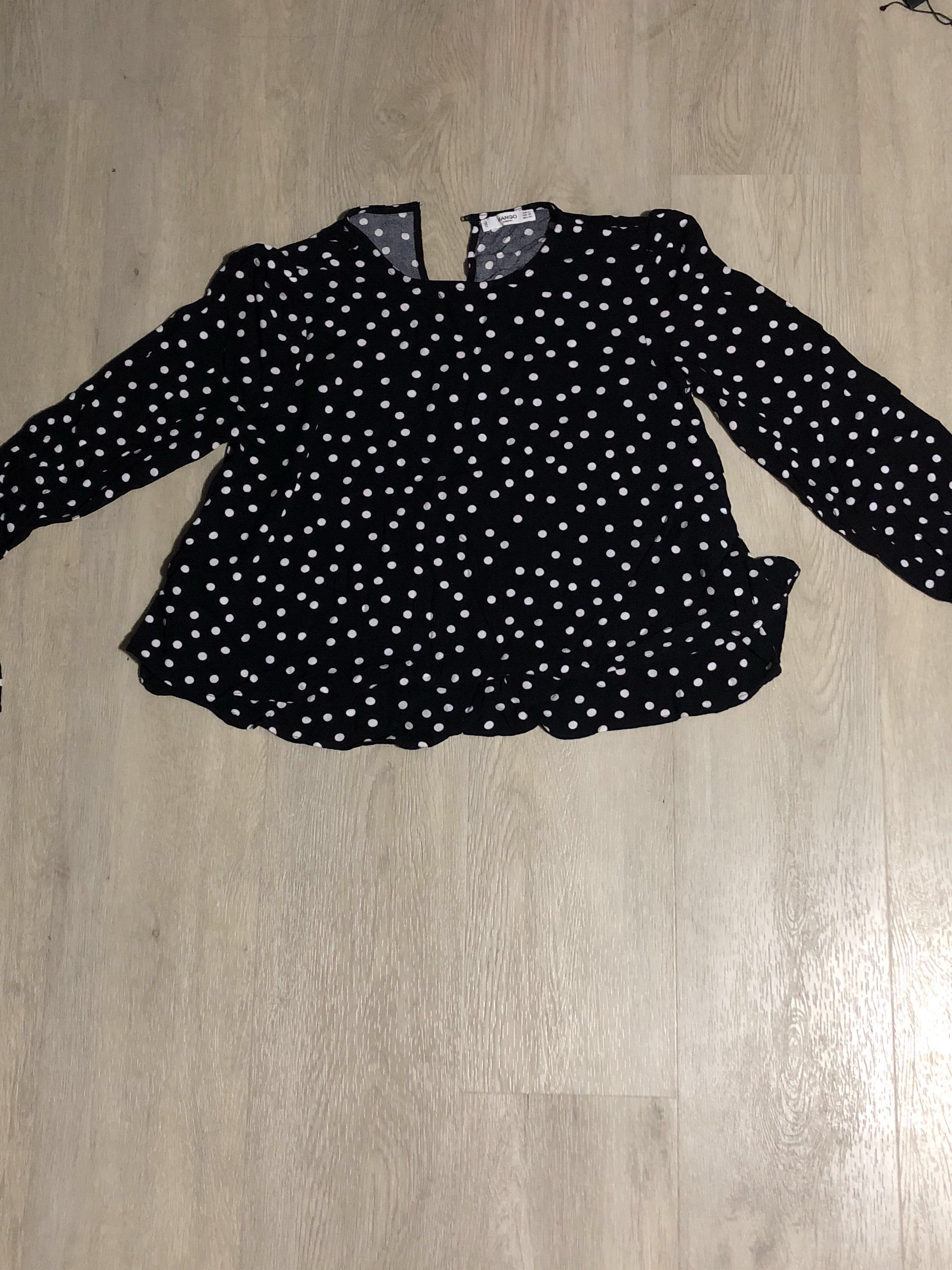 navy blue blouse with white polka dots