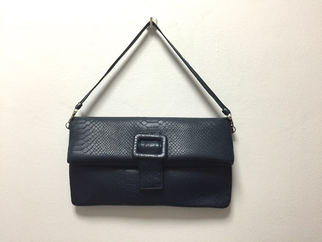 blue snakeskin clutch bag