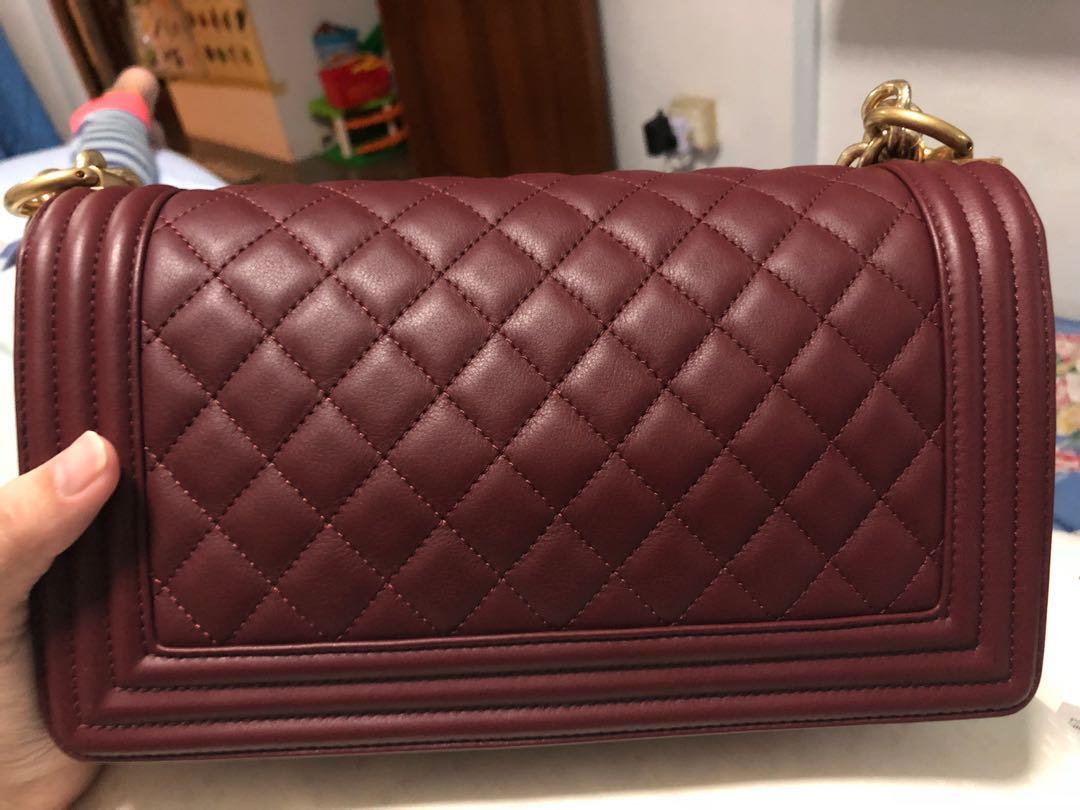Chanel boy burgundy with ghw, Luxury, Bags & Wallets on Carousell